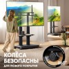 Мобильная моторизованная стойка ONKRON для ТВ 50-120 (200x200 до 900x800) - максимальная нагрузка 120кг, высота 910-1560мм, с кабель-каналом и регулируемой полкой, черная